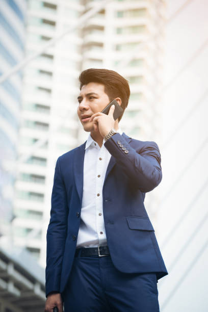 istock Business man speaking on the phone 825235988