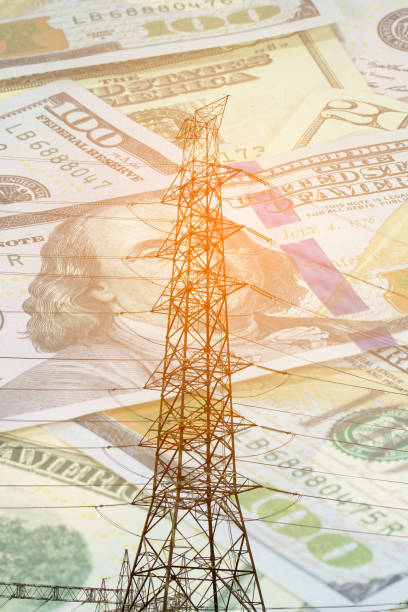 istock Double exposure of high voltage electrical pole structure with dollar money 825242380