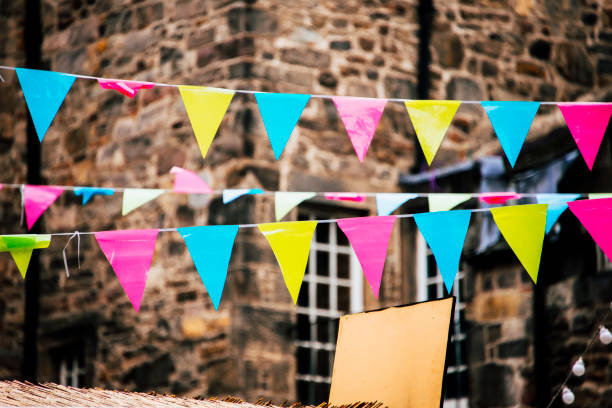Some colorful party pennants at a street