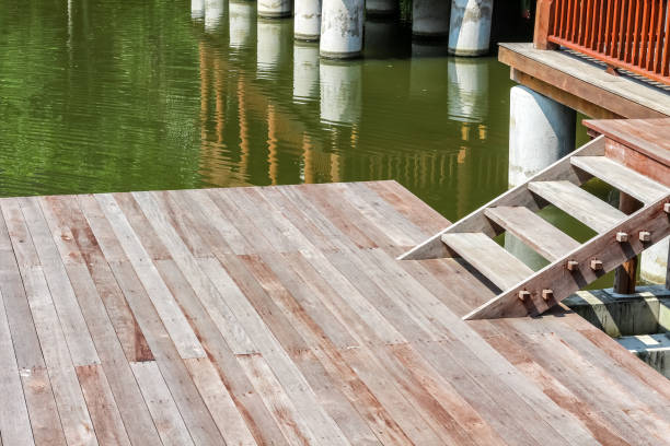 istock Thai style house with ladder into the river 825250582