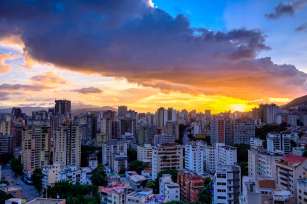 istock Vibrant Sunset over City Buildings 825250912
