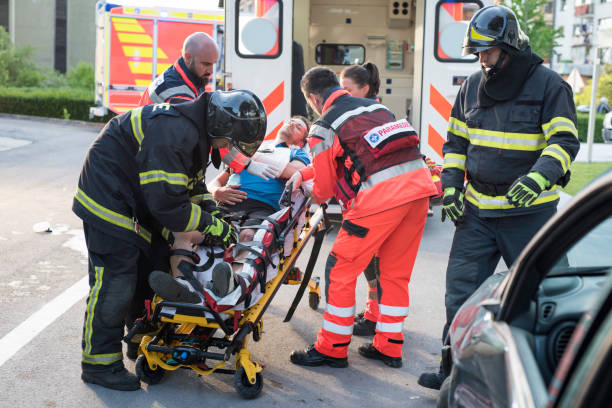 istock Paramedics and firefighters on accident scene 825261870