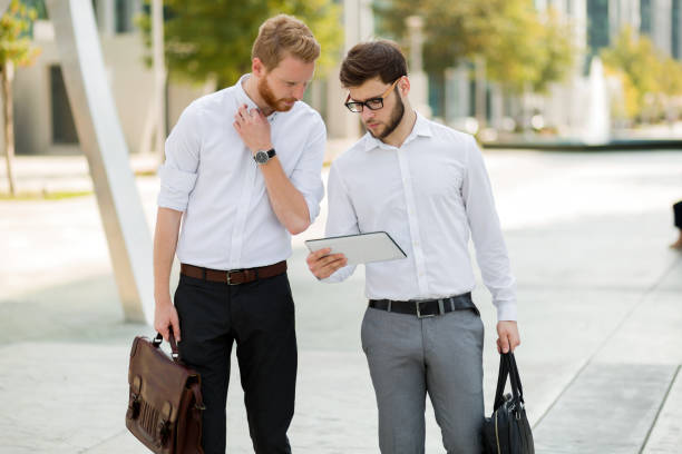 istock Business people talking outdoors 825266986