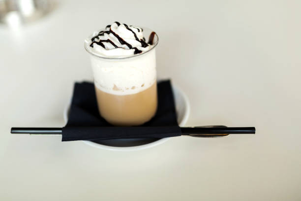 istock Long coffee with creme and hot chocolate on table 825267116