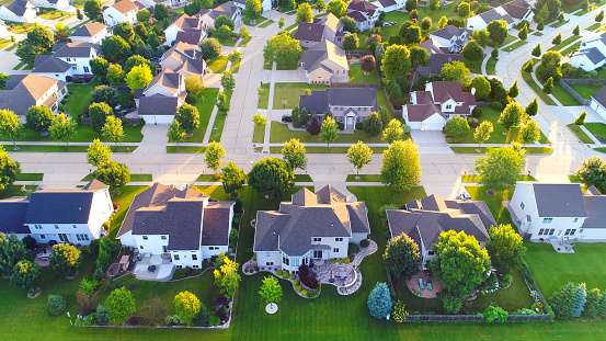 Exceptionally beautiful neighborhoods, homes, aerial view at sunrise.