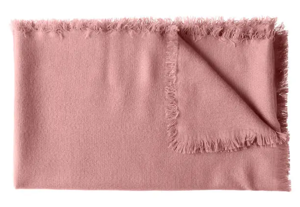 Pink rose pale folded wool shawl blanket isolated on white