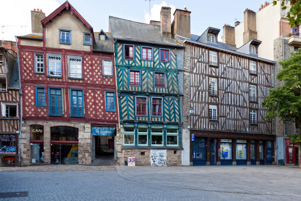 Half-timbered buildings in Rennes Rennes, France - July 30 2017: Old half-timbered houses in the old city center of Rennes in Brittany. rennes france photos stock pictures, royalty-free photos & images