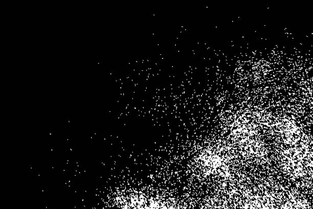 istock Grainy grunge abstract texture on black background. Vector splatter of calligraphy ink in white on black background. White ink blow explosion on black background. Paint spray, drop. Vector. 825295216