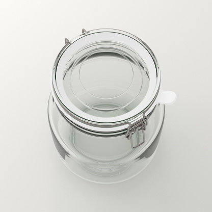 Empty glass jar with clamp lid. Isolated on white background with clipping path around jar. 3d illustration