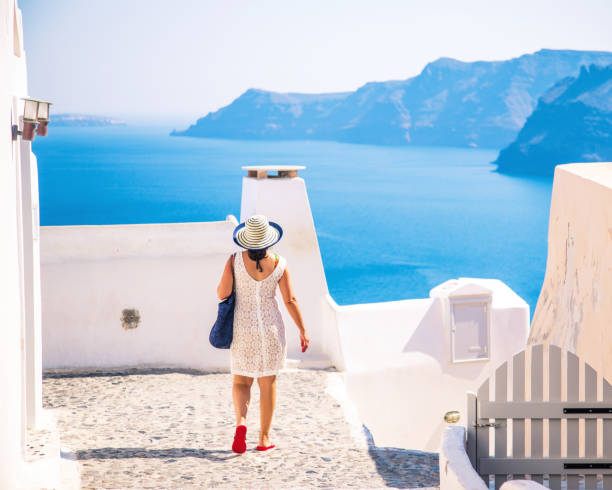 istock Woman in Santorini 825302576