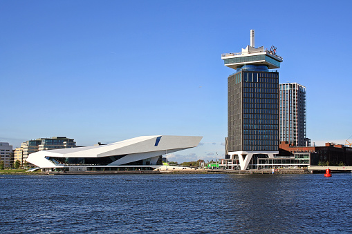 Amsterdam, Netherlands - May 14, 2017: EYE Film Institute and A'DAM Tower on May 14, 2017 in Amsterdam, Netherlands. Both modern buildings are sights and entertainment places in Amsterdam.