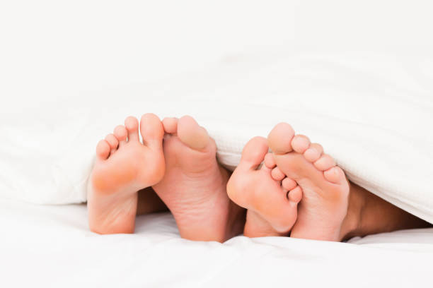 istock Close up of four feet 825332880