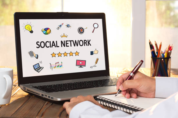 istock Social Network Concept On Work Desk With Various Doodle Icons 825334070