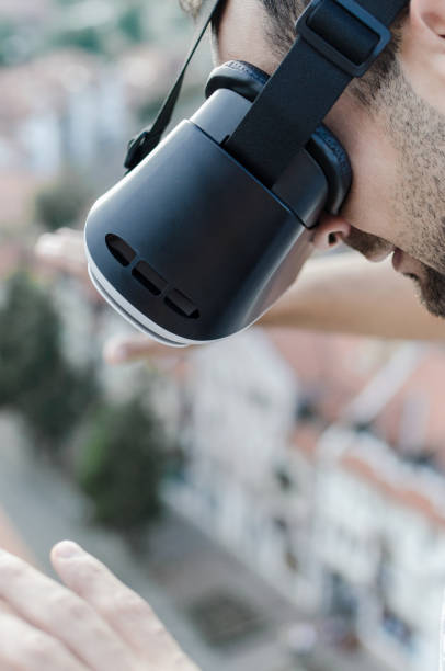 istock happy free man with virtual reality headset 825344716