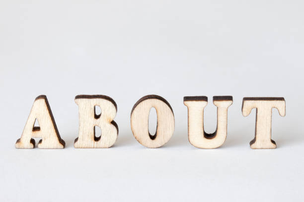 istock about, Wood letters ABOUT on White background 825356342