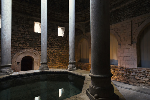 GIRONA, SPAIN - 29 JUNE 2017 -View of interior of the so-called Arab baths of Girona constitute a Christian building of Romanesque style in Girona, Catalonia, Spain