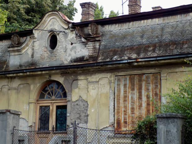 istock Old abandoned house in the residential area 825363504