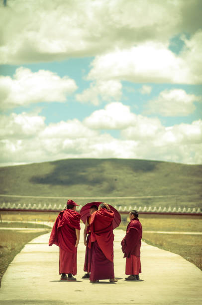 Kathmandu, Nepal- April 20,2023 : Buddhist monks walk the streets of Kathmandu, the capital of Nepal.