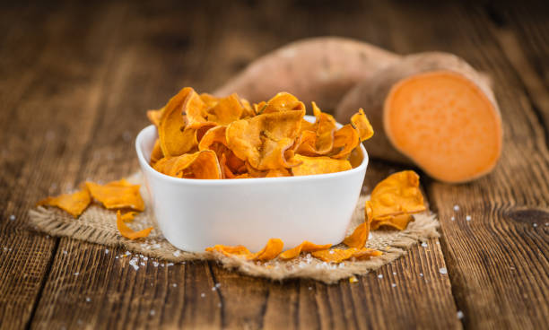 istock Portion of Sweet Potato Chips , selective focus 825368818