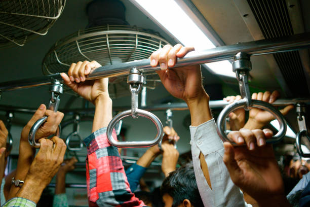 Commuters On the subway in Mumbai india train stock pictures, royalty-free photos & images