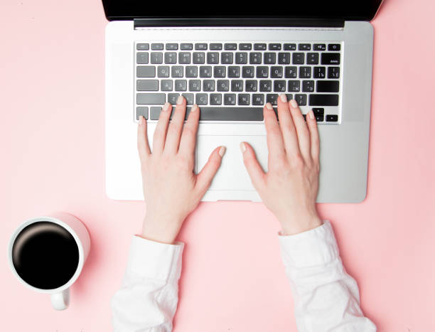 istock Cup of coffee and businesswoman hands with notebook 825372004