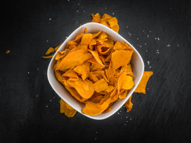 istock Portion of Sweet Potato Chips , selective focus 825372384