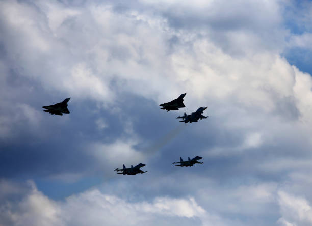 istock Five russian fighters of a new generation in the sky 825375694