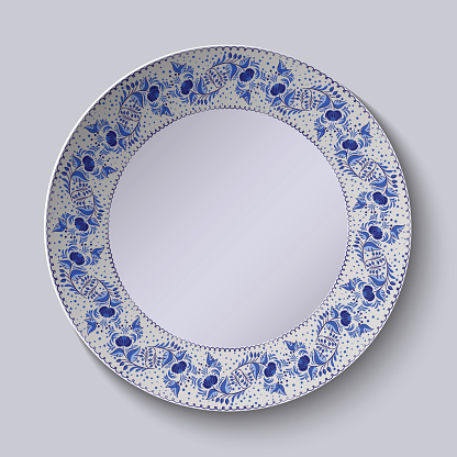 Decorative plate with floral pattern in blue and white space in the center. Stylized Gzhel. Vector illustration.