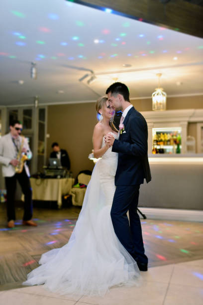 istock Wedding couple in the restaurant is dancing 825379102