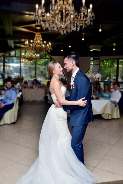 istock Wedding couple in the restaurant is dancing 825379148