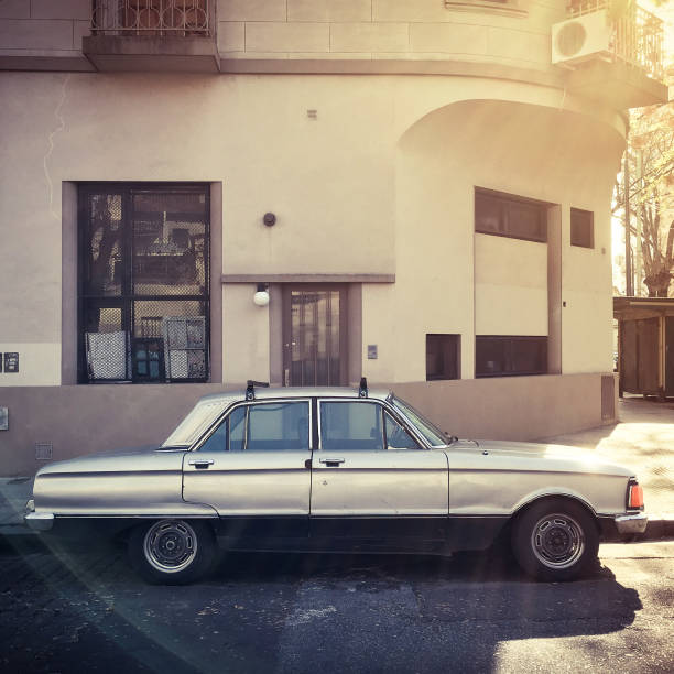 istock Old car parked in the street 825389478