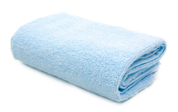 istock Blue towel isolated on white background 825391044