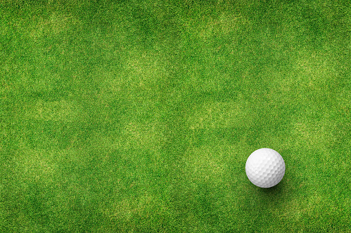 Golf ball in dramatic darkness. / You can see the animation movie of this image from my iStock video portfolio. Video number: 1456534439
