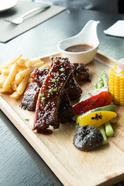 istock Pork Ribs With BBQ Sauce 825404564
