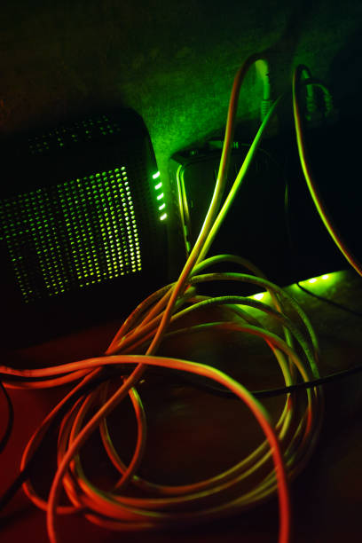 istock High speed modem and wireless router at night. 825405824