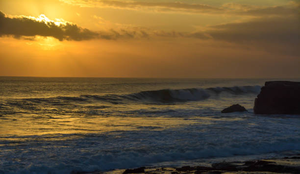 istock Tanah lot temple Sunset in Bali 825408804