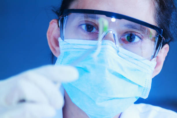 istock Scientist working,scientists working at the laboratory,scientist leaning against the whiteboard in laboratory,scientist background,female scientist looking microscope in laboratory,scientists study. 825410128