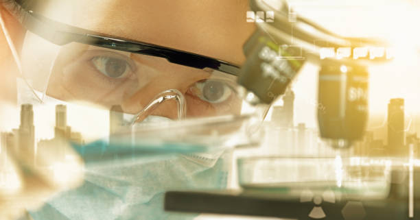 istock Double exposure of scientist with equipment and science experiments ,laboratory glassware containing chemical liquid for design or decorate science or other your content,copy space,mock up. 825410274