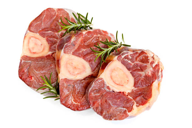 Raw Osso Bucco Veal Shanks Top View Isolated Raw osso bucco veal shanks, top view, isolated on white. ossobuco stock pictures, royalty-free photos & images