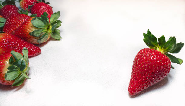 istock Bunch of Strawberries on white background 825416904