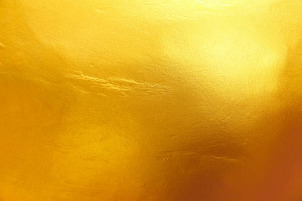 textura de oro para el fondo y diseño - gilded fotografías e imágenes de stock