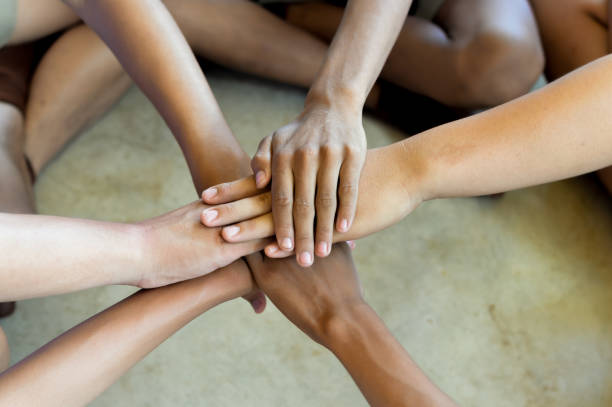istock Success Partnership Business Partners Team meeting Successful Teamwork Hands Gesture. Hands stack group of people. Partnership Business Concept.Close-Up hands, Teamwork.selective focus. 825424634