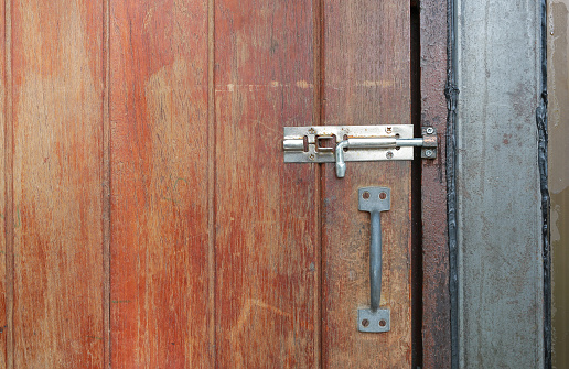 latch on an old wooden door.