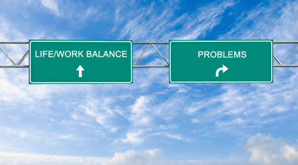 istock Direction road sign with  words life/work balance and problems 825431854