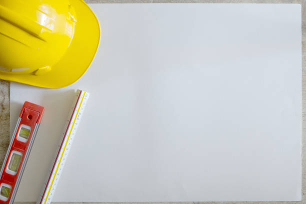 istock The safety hat yellow  top view work station 825432680