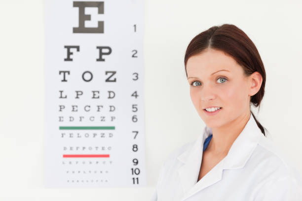 istock Female optician with eye test 825436108