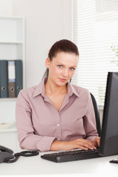 istock Businesswoman working in her office 825442836