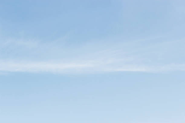 istock Blue sky Soft white clouds against blue sky background and empty space for your design 825443000