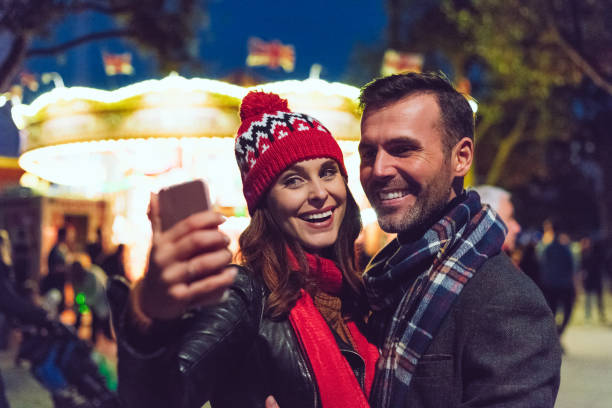 istock Beautiful woman taking a selfie with her husband 825453946