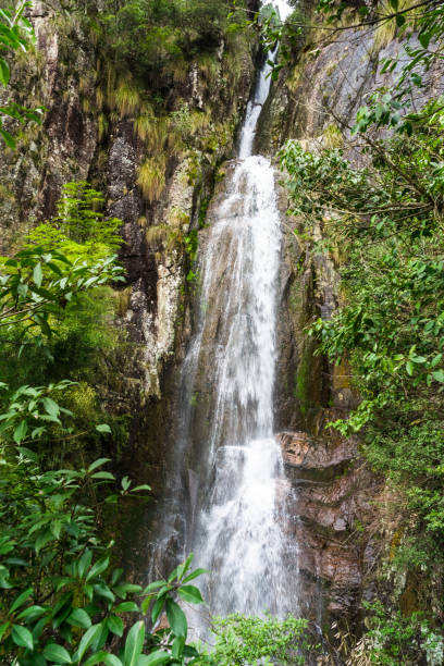 istock Close-Up Of waterfall  Flowing Through Rocks 825457398
